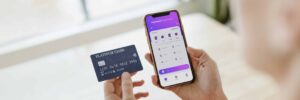 Woman Using A Mobile Phone Mockup To Shop Online D 2022 12 15 23 43 40 Utc Scaled 1