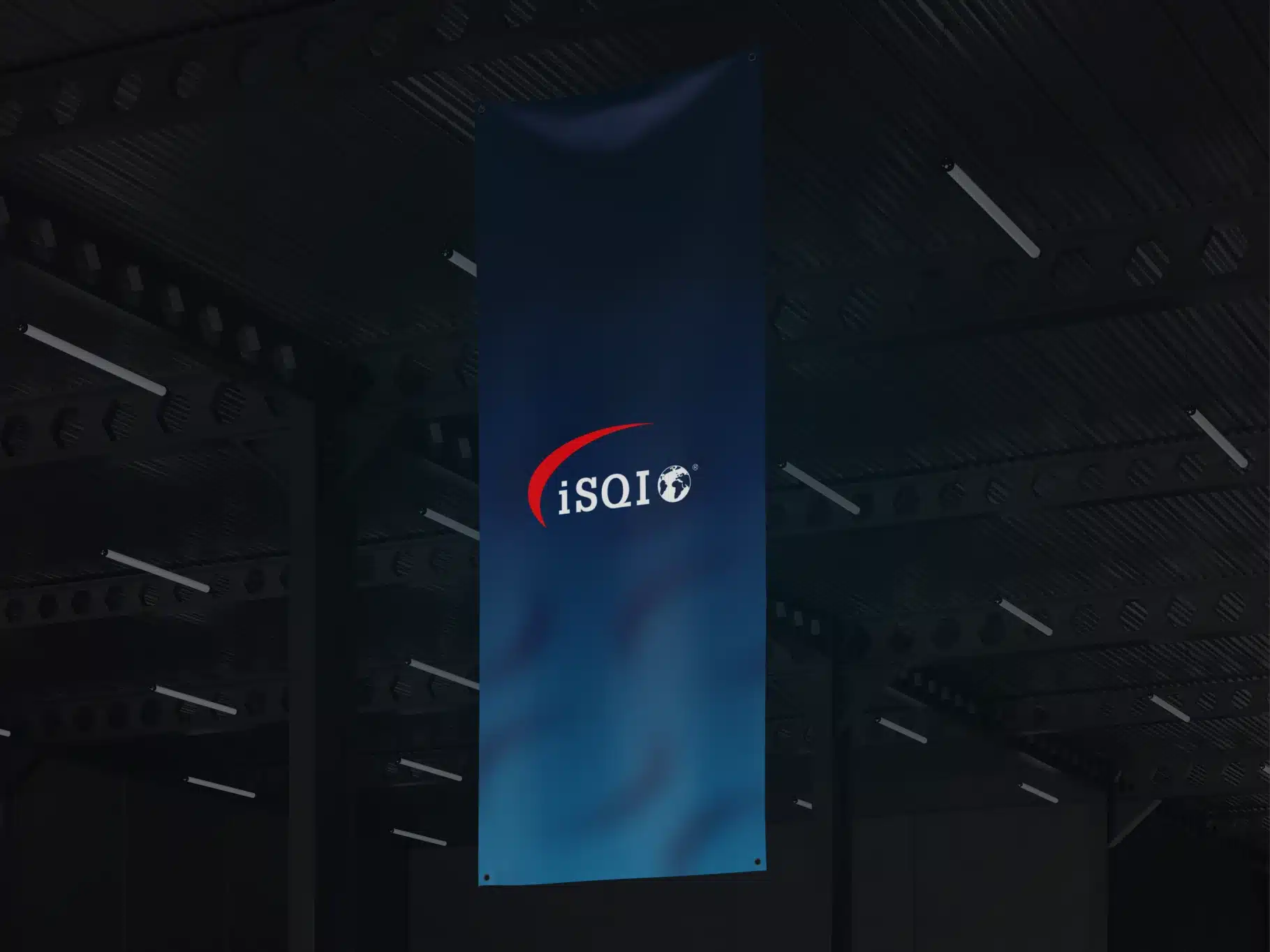 Blue iSQI hanging-banner design in an industrial exhibition setting