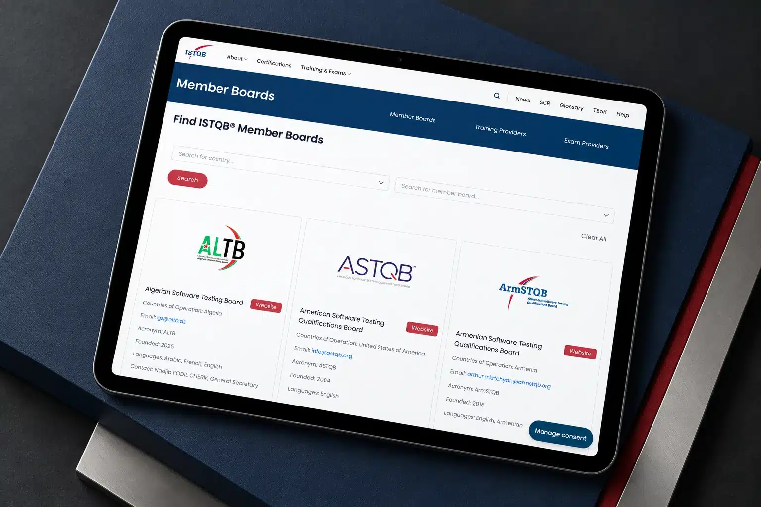ISTQB member-board finder displayed on an iPad Pro over navy and brushed-metal surfaces